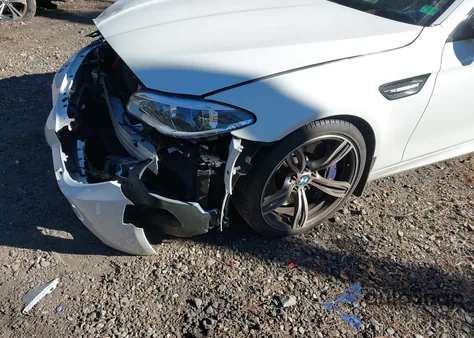 2016 BMW M5 z USA, uszkodzony, nr VIN WBSFV9C52GD595775